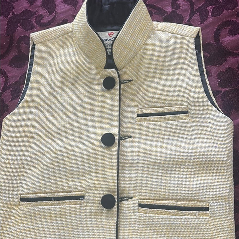 Cream Sleeveless Nehru Jacket with Black Accents